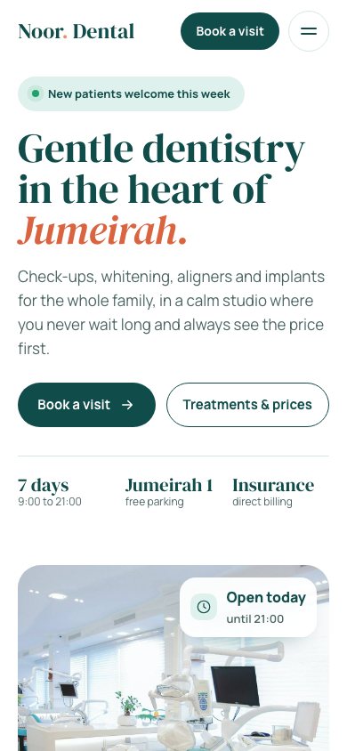 Noor Dental sample website on a phone